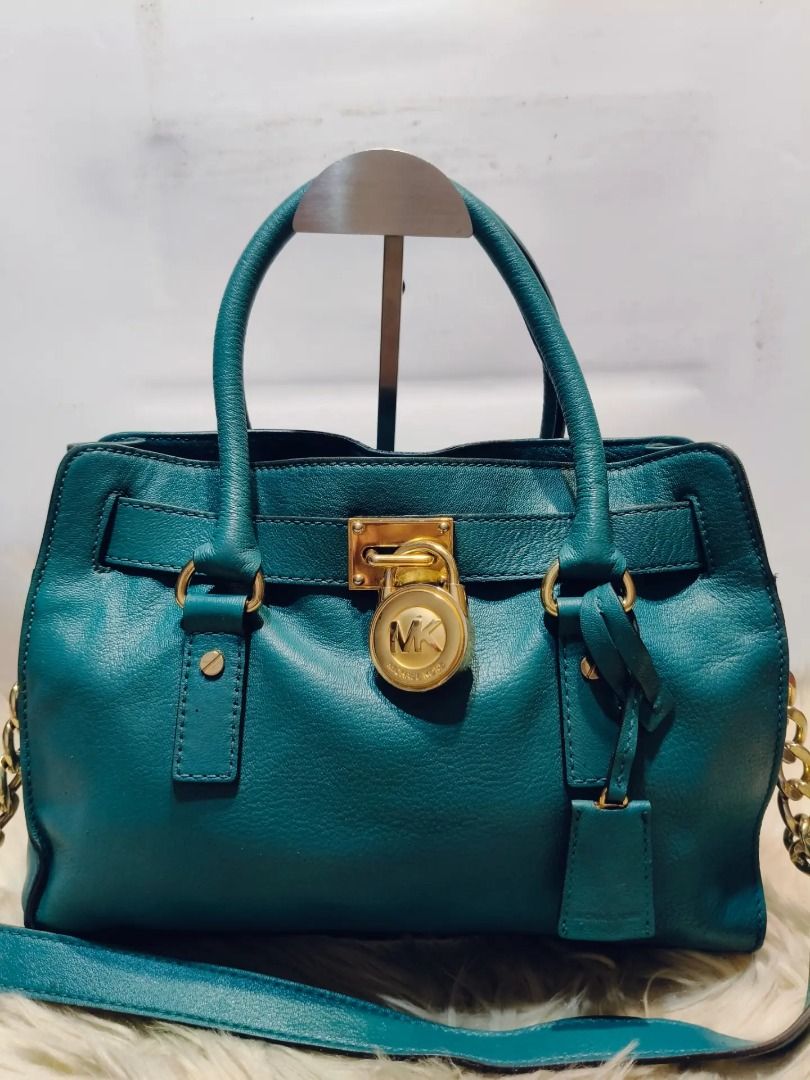 Original MICHAEL KORS (Category: Shoulder Bags) located in Cabuyao City. Submitted by your____lux____shop (Listing ID 1470878637, Image 3). Description: Sale❗️Sale❗️Sale❗️ ₱ 2,899 Original Michael Kors Hamilton Preloved w/ padlock & key Dark teal Medium Pure genuine leather 📌First to pay!.