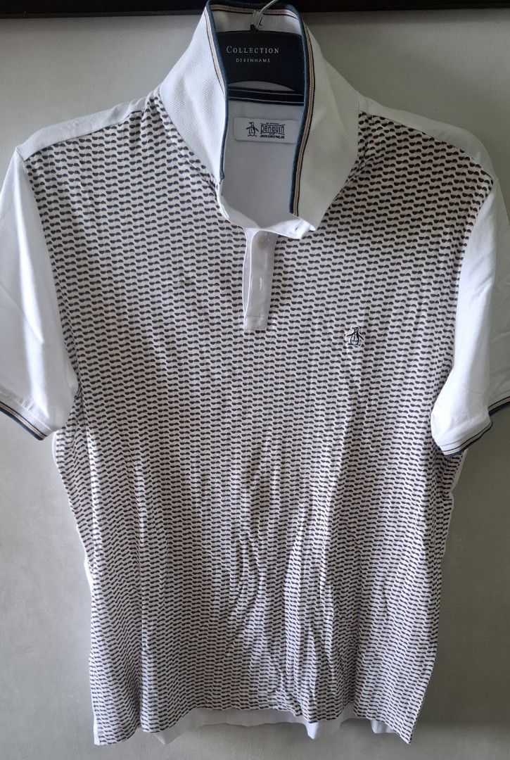 Original Penguin Patterned Polo Shirt (Category: Tshirts & Polo Shirts ) located in Taguig. Submitted by atticusmerch (Listing ID 1470779755, Image 1). Description: - Brand: Original Penguin - Color: White with geometric half-circle pattern on front (solid white back and sleeves) - Material: 100% Cotton, machine washable - Fit: Standard fit - Features: Short sleeves, button placket, collar with contrast piping - Condition: Brand new / Excellent q