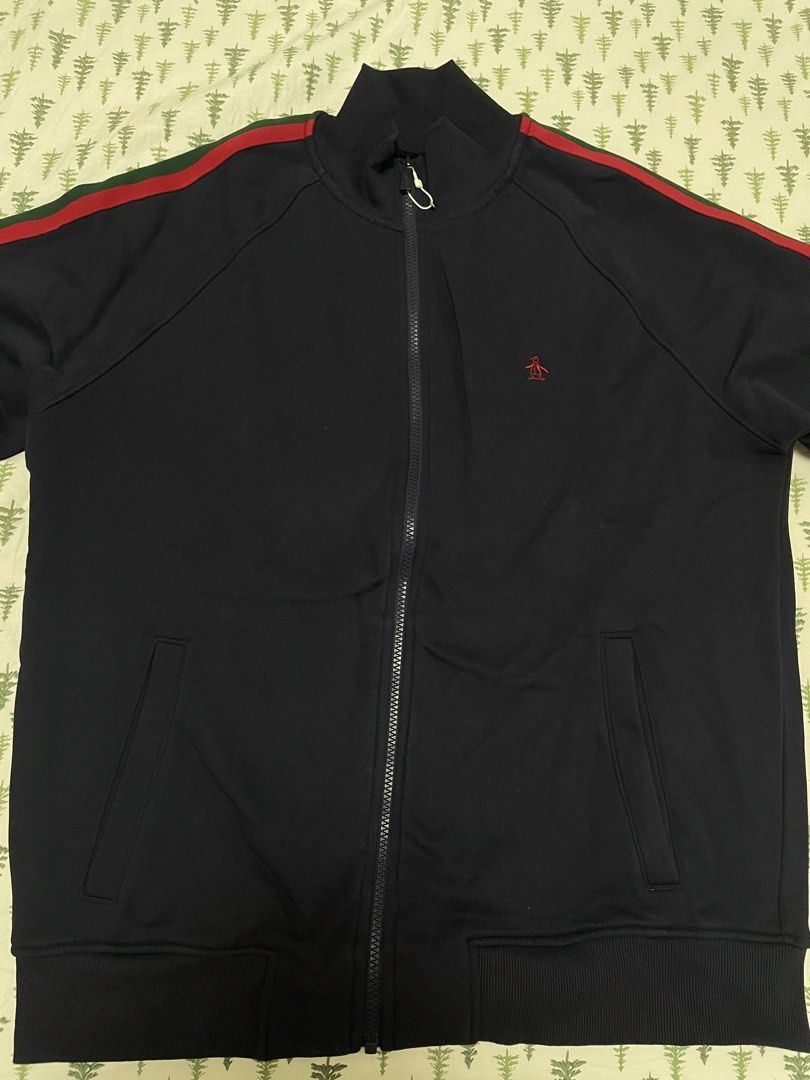 Original Penguin Track Jacket Black with Red Green Stripes (Category: Coats, Jackets and Outerwear) located in Angeles City. Submitted by lukemafinds (Listing ID 1470768039, Image 3). Description: - Brand: Original Penguin - Color: Black with red and green sleeve stripes (GUCCI COLORWAY) - Details: Red embroidered logo on chest, full zip front with branded metal puller, two side pockets - Trim: Ribbed collar, cuffs, and hem - Condition: Clean pie