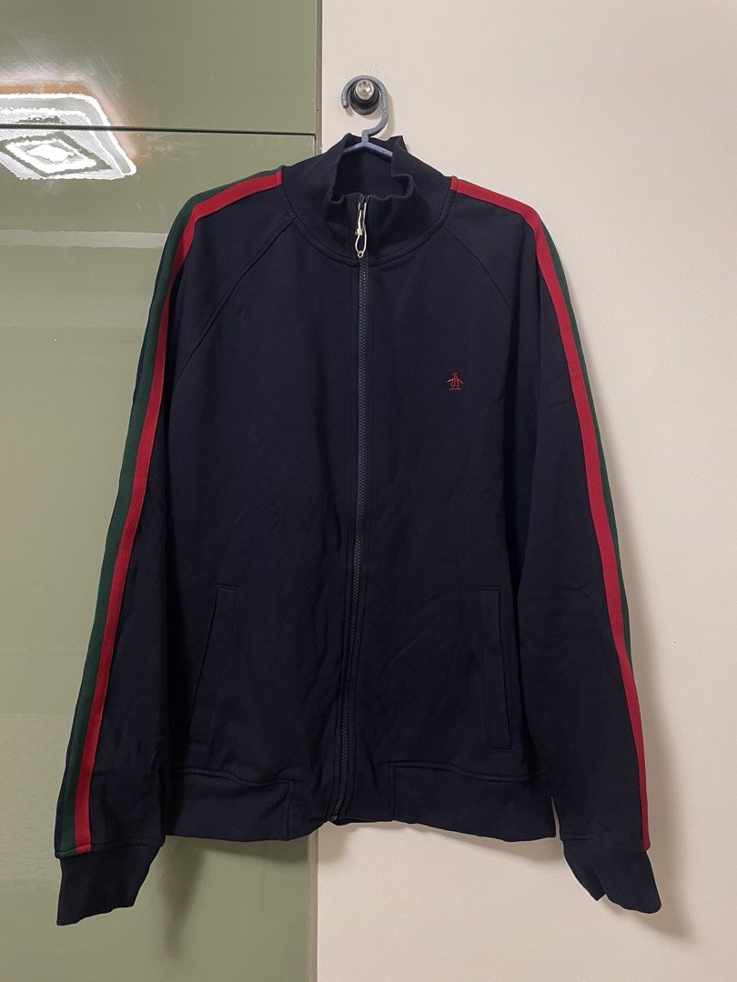 Original Penguin Track Jacket Black with Red Green Stripes (Category: Coats, Jackets and Outerwear) located in Angeles City. Submitted by lukemafinds (Listing ID 1470768039, Image 1). Description: - Brand: Original Penguin - Color: Black with red and green sleeve stripes (GUCCI COLORWAY) - Details: Red embroidered logo on chest, full zip front with branded metal puller, two side pockets - Trim: Ribbed collar, cuffs, and hem - Condition: Clean pie