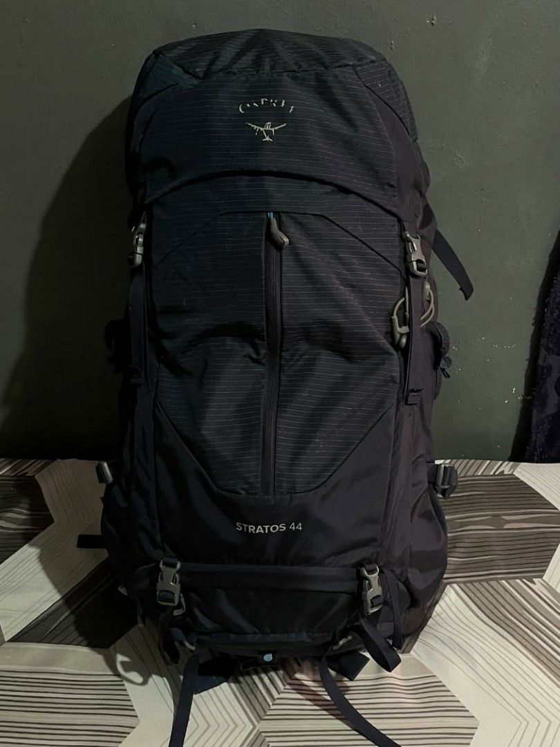 OSPREY STRATOS HIKING BACKPACK 44L (Category: Backpacks) located in Batangas. Submitted by n1tchz (Listing ID 1470793308, Image 1). Description: Osprey Stratos 44L Color: Navy Blue Condition: Used Faded front logo Orig rain cover included Dm me, ty!.