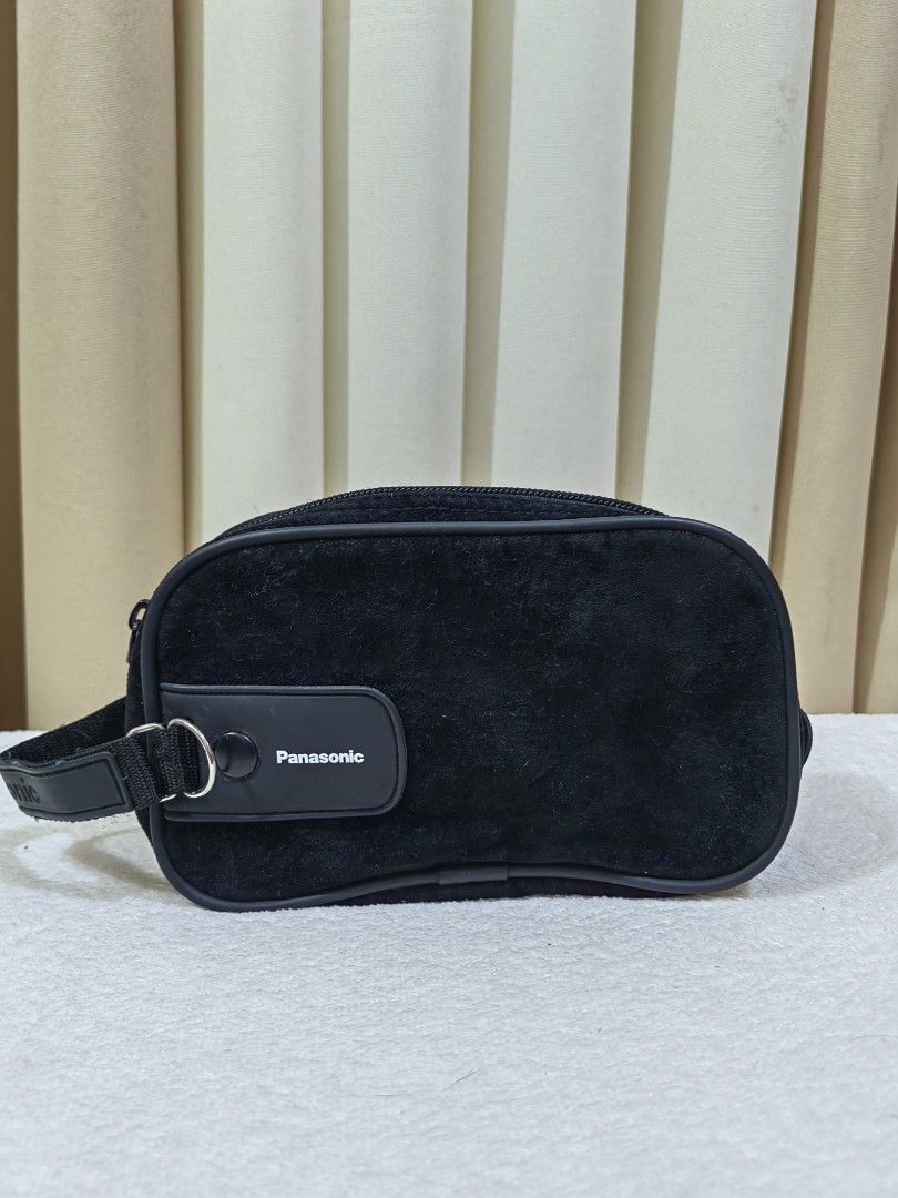 Panasonic Digicam Black Pouch Camera Bag (Category: Camera Bags & Carriers) located in Makati City. Submitted by prelovedtreatedwithlove (Listing ID 1470875105, Image 1). Description: - Authentic Panasonic black digicam pouch - Compact size with a soft, velvety exterior - Ideal for small digital cameras, memory cards, or daily accessories No issue .