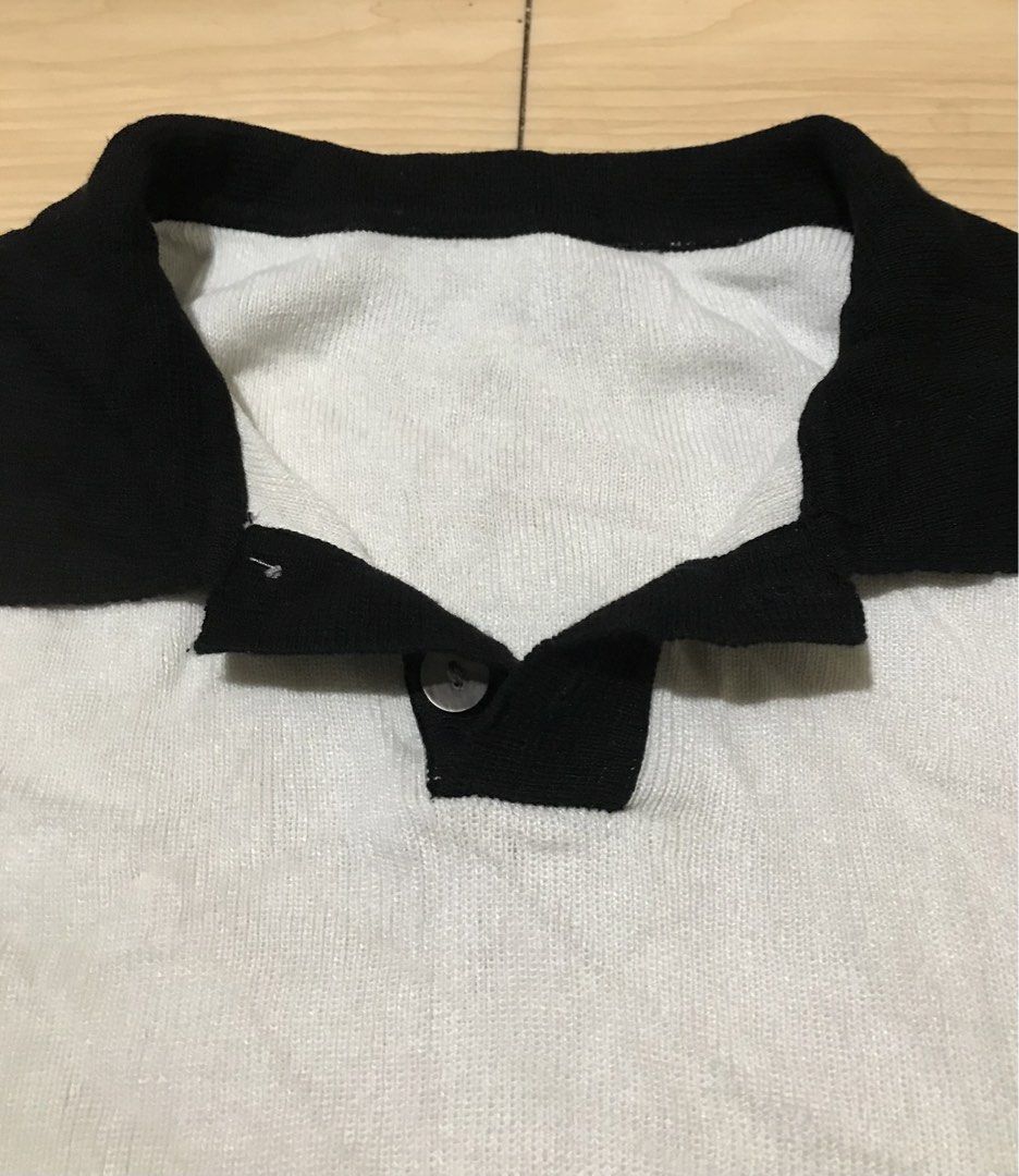Panda knit polo shirt (Category: Tshirts & Polo Shirts ) located in Manila. Submitted by thriftowear98 (Listing ID 1470744362, Image 3). Description: PANDA POLO - OLD MONEY LOOK FOR LESS! 🐼🐼 White x Black contrast - cleanest polo style DETAILS: ✓ Color: White body, Black collar & cuffs ✓ Size: M to L (Fits Medium - Large) ✓ Dimes 21x27 ✓ Fabric: Soft Knit, presko & stretchy ✓ Style: Cuban / Open Collar - Korean Old Money ✓ Condition: 9.5/10 Exc