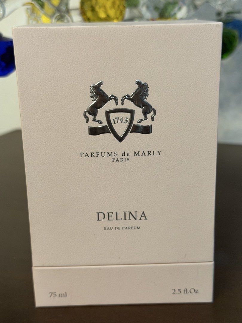 Parfums de Marly Delina Eau de Parfum 75ml (Category: Fragrance & Deodorants) located in Quezon City. Submitted by mommaofthreeaidans (Listing ID 1470750043, Image 2). Description: - Authentic Parfums de Marly Delina Eau de Parfum - Generous 75ml bottle size - Iconic fragrance featuring luxurious notes of rose and lychee - Comes with the original outer packaging box - Includes signature decorative tassels and metallic cap with embedded crystal de