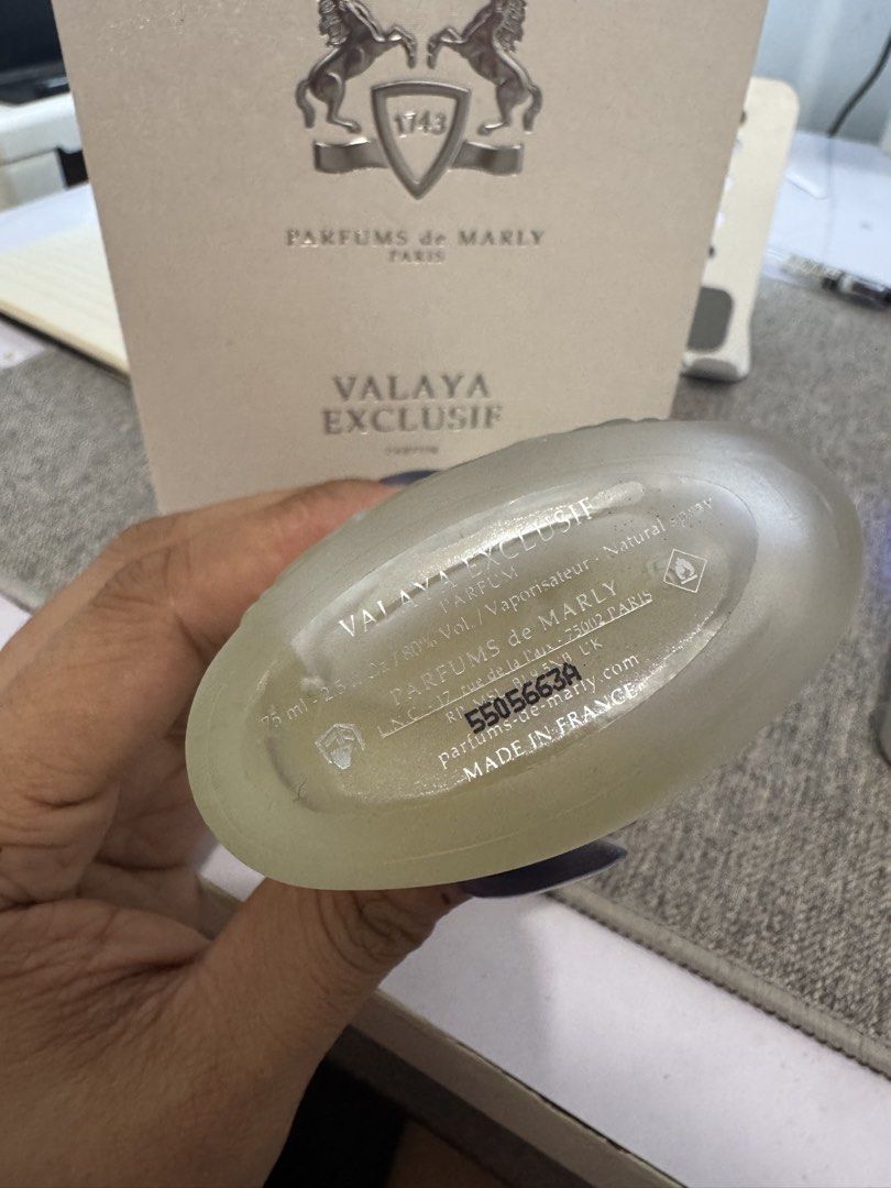 Parfums de Marly Valaya Exclusif Parfum 75ml (Category: Fragrance & Deodorants) located in Marikina City. Submitted by potchayy (Listing ID 1470881326, Image 3). Description: Parfums de Marly Valaya Exclusif parfum bottle in 75ml / 2.5 fl.oz size. Frosted glass bottle with decorative cap and white braided cord detail around the neck. Batch number 505663A stamped on the bottom and matching box. Includes the original textured outer box with batch c