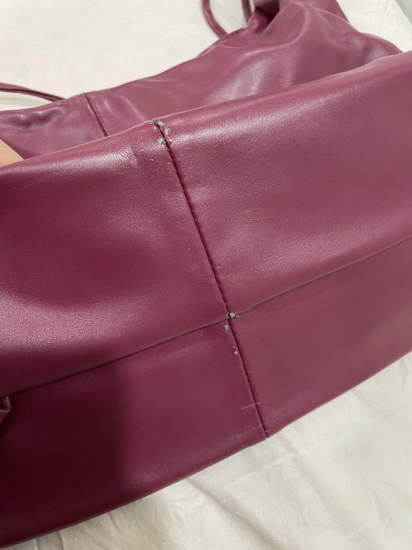 Parisian Wine Color Hobo Bag (Category: Shoulder Bags) located in Pasay City. Submitted by nashandma_ (Listing ID 1470906799, Image 2). Description: Only stored never used (flaws caused by storage) Rfs: Decluttering / impulse buy.