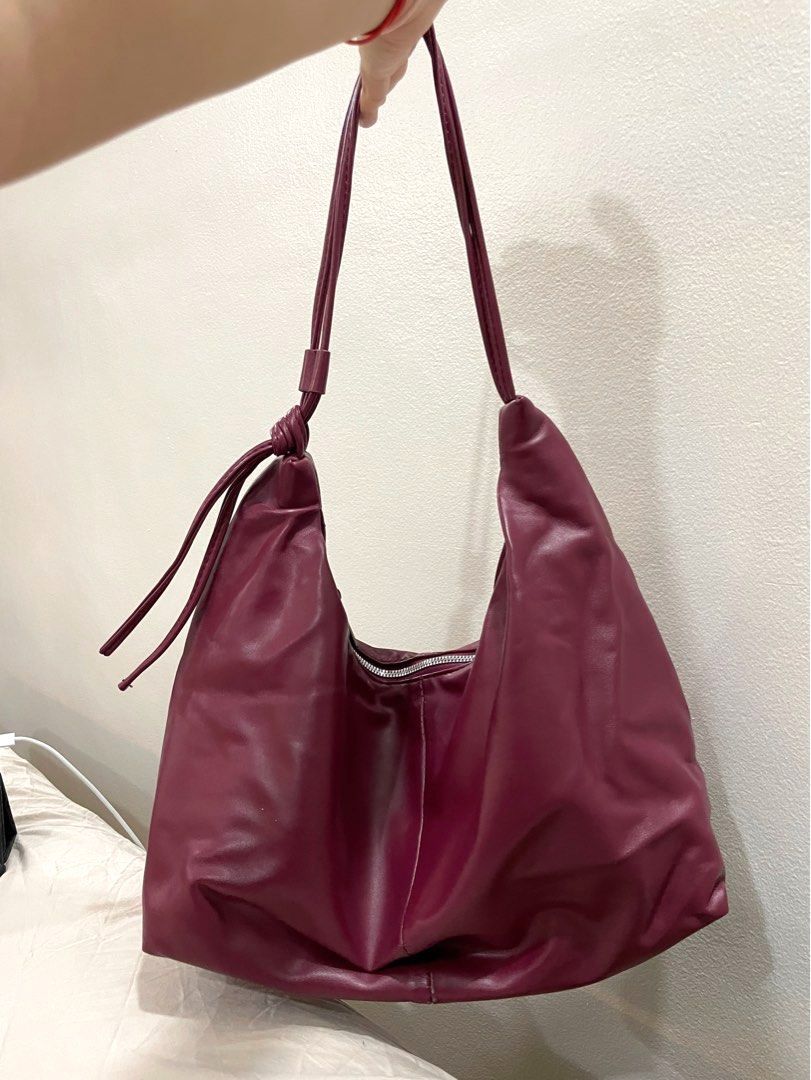 Parisian Wine Color Hobo Bag (Category: Shoulder Bags) located in Pasay City. Submitted by nashandma_ (Listing ID 1470906799, Image 1). Description: Only stored never used (flaws caused by storage) Rfs: Decluttering / impulse buy.