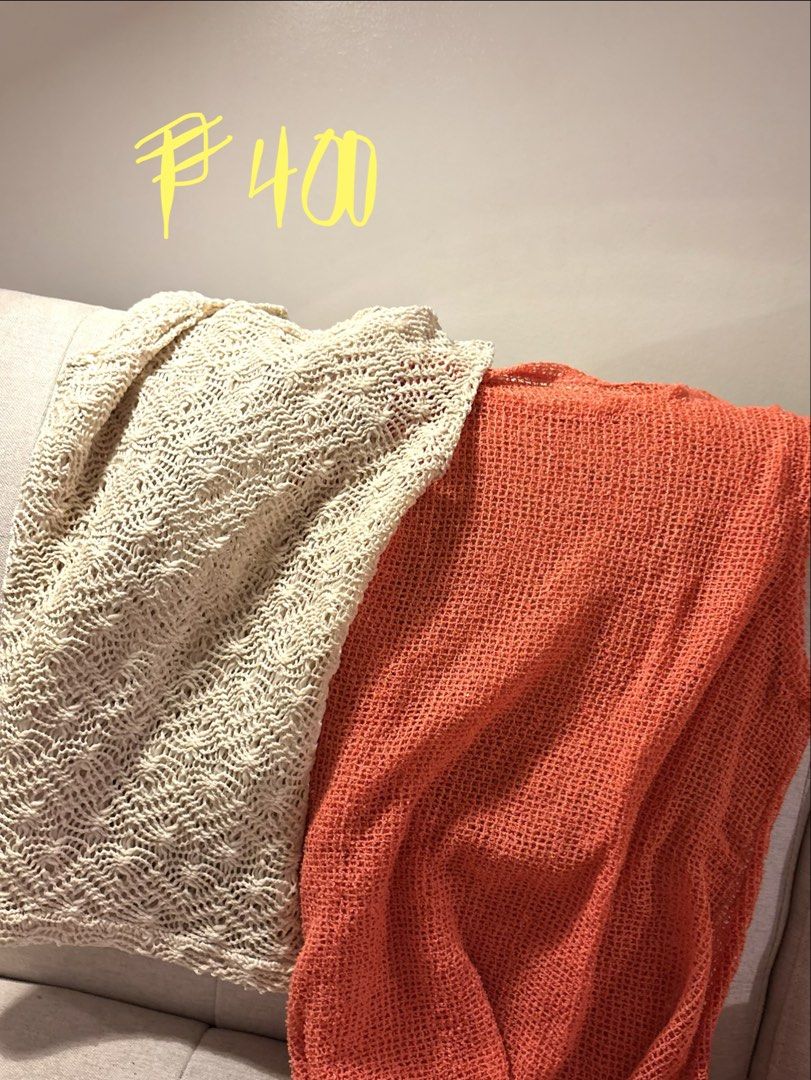 Pastel Ma'am & St. He Net Knit Tops Bundle (2 pcs) (Category: Longsleeves) located in Pasig City. Submitted by shitaku.ph (Listing ID 1470856484, Image 1). Description: - Set of 2 mesh knit sleeveless tops - Colors & Brands: Cream (Pastel Ma'am) and Vibrant Orange (St. He) - Features: Airy, see-through fabric, perfect for layering over bralettes or swimsuits - Condition: Good shape, worn only a couple of times - Price: 400 pesos total for the set