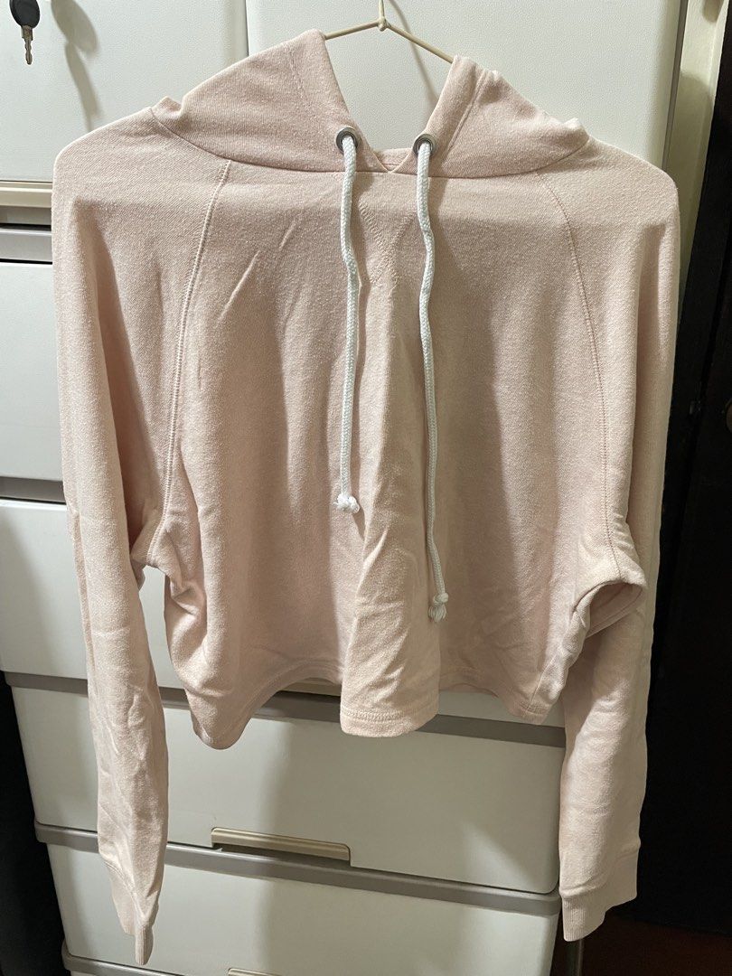 Pastel Pink Crop Hoodie with Drawstring (Category: Coats, Jackets and Outerwear) located in Manila. Submitted by ysadeclutters (Listing ID 1470803463, Image 1). Description: Decluttering [ Preloved] Small to medium Frame - Color: Pastel pink - Style: Crop hoodie with long sleeves and raglan shoulders - Details: White drawstring cord with metal eyelets and aglets - Hem: Raw edge hem at the bottom with ribbed cuffs - Material: Soft and comfortable 
