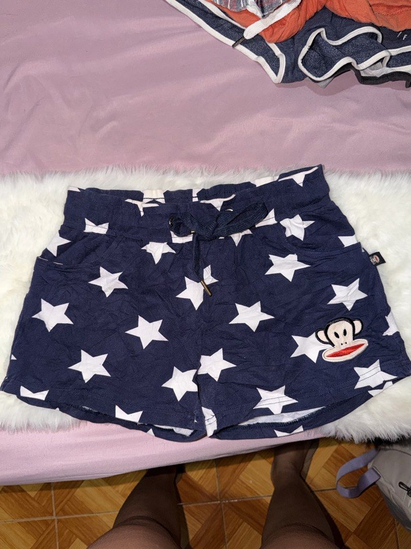 Paul Frank Star Print Shorts (Category: Shorts) located in Manila. Submitted by maureenn10 (Listing ID 1470841616, Image 1). Description: - Design: Navy blue with an all-over white star print and cute Paul Frank monkey patch - Fit: Relaxed fit with an adjustable drawstring waistband - Pockets: Deep side pockets for your phone and essentials - Material: Soft and breathable cotton fabric - Best for: Lounging at home or casual lakwatsa days - Condit