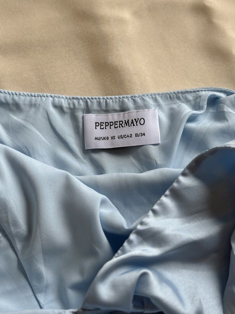 Peppermayo Light Blue Satin Halter Mini Dress (Category: Dresses) located in Las Pinas. Submitted by flyfarflower (Listing ID 1470900509, Image 3). Description: Actual pictures posted 📸. J&T Express or Lalamove/Grab 📦 Fits XS Bust: 30-32”.