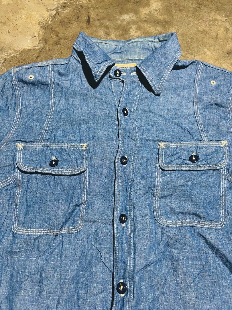 Pherrow's 770WS Stormy Blue Mfg. Chambray Work Shirt (Category: Tshirts & Polo Shirts ) located in Manila. Submitted by kashjulliane (Listing ID 1470923821, Image 2). Description: - Brand: Pherrow's - Style: Vintage chambray work shirt in light blue - Details: Two button-flap chest pockets, contrast white triple-needle stitching - Accents: Dark front buttons, curved hem with cool character/fraying at the side gusset - Condition: Great patina with