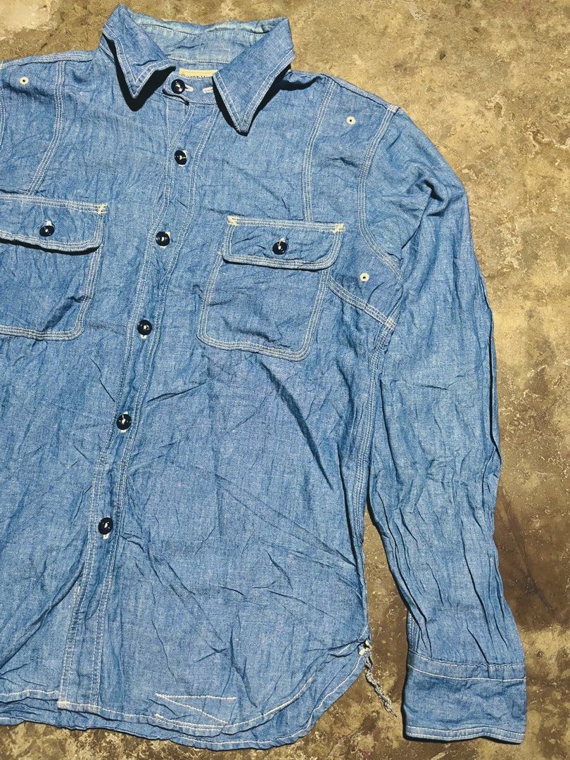 Pherrow's 770WS Stormy Blue Mfg. Chambray Work Shirt (Category: Tshirts & Polo Shirts ) located in Manila. Submitted by kashjulliane (Listing ID 1470923821, Image 3). Description: - Brand: Pherrow's - Style: Vintage chambray work shirt in light blue - Details: Two button-flap chest pockets, contrast white triple-needle stitching - Accents: Dark front buttons, curved hem with cool character/fraying at the side gusset - Condition: Great patina with