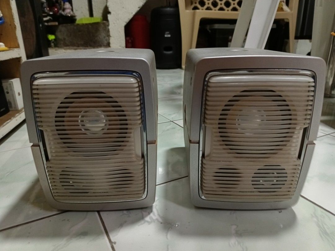 Philips MC-V320 Micro System Left and Right Speakers (Category: Soundbars, Speakers & Amplifiers) located in Manila. Submitted by caaths_collection (Listing ID 1470823710, Image 2). Description: - Model: Philips MC-V320 micro system speakers (Left and Right pair) - Design: Compact bookshelf size in a stylish silver and beige finish with protective grilles - Connectivity: Built-in speaker wires attached at the back, ready to plug into your compati