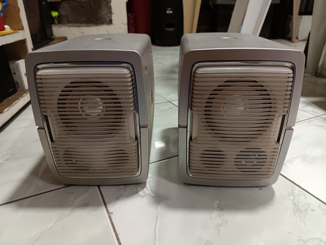 Philips MC-V320 Micro System Left and Right Speakers (Category: Soundbars, Speakers & Amplifiers) located in Manila. Submitted by caaths_collection (Listing ID 1470823710, Image 1). Description: - Model: Philips MC-V320 micro system speakers (Left and Right pair) - Design: Compact bookshelf size in a stylish silver and beige finish with protective grilles - Connectivity: Built-in speaker wires attached at the back, ready to plug into your compati