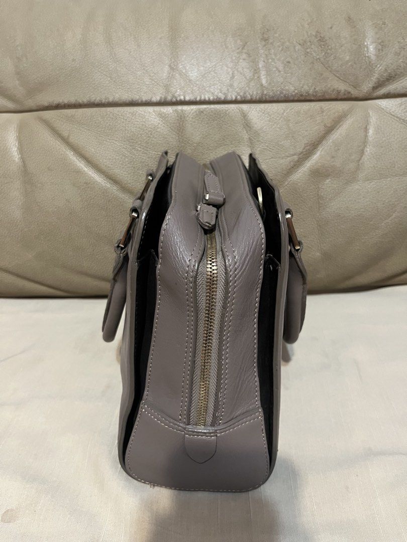 Picard Leather Satchel Handbag (Category: Luxury Bags & Wallets) located in Calamba. Submitted by jupreloved_ (Listing ID 1470792462, Image 2). Description: Picard taupe leather handbag with gold hardware. Features dual top handles, zip top closure, organized interior compartments, and a bonus back zip pocket. Brand: Picard Size: Medium Shipping through J&T. Payment are strictly through GCASH only, no COD. Exact size and color may be different fr