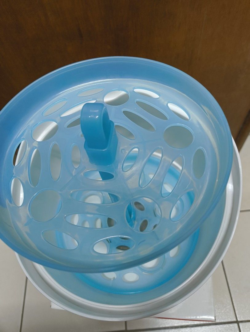 Pigeon Single-function Steam Sterilizer (Category: Breastfeeding & Bottle Feeding) located in Antipolo. Submitted by kei.regalado (Listing ID 1470862100, Image 3). Description: - Brand: Pigeon Single-Function Steam Sterilizer - Capacity: Holds up to 5 baby bottles and accessories at once - Fast Operation: Quick ~9-minute cycle with easy one-button operation - Condition: Clean heating plate, ready for immediate use - Inclusions: Original box, blue