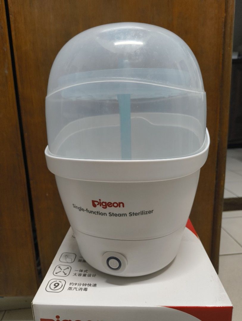Pigeon Single-function Steam Sterilizer (Category: Breastfeeding & Bottle Feeding) located in Antipolo. Submitted by kei.regalado (Listing ID 1470862100, Image 2). Description: - Brand: Pigeon Single-Function Steam Sterilizer - Capacity: Holds up to 5 baby bottles and accessories at once - Fast Operation: Quick ~9-minute cycle with easy one-button operation - Condition: Clean heating plate, ready for immediate use - Inclusions: Original box, blue