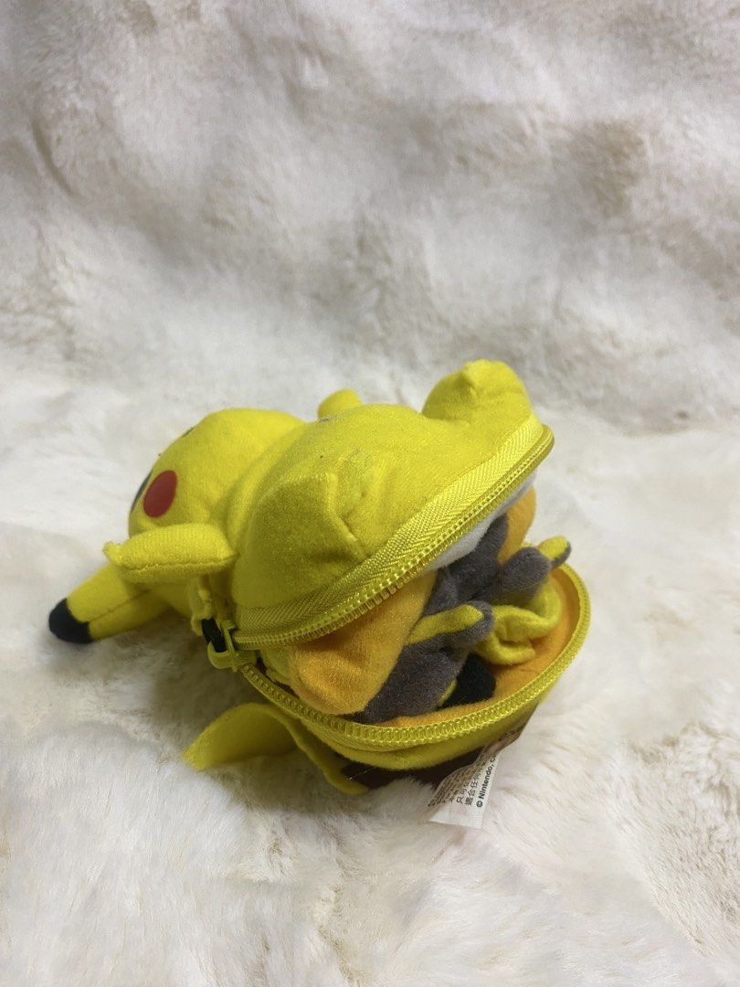 Pikachu/Raichu reversible flip zipper plush (Category: Plushies & Soft Toys) located in Kalibo. Submitted by ollie_stuffshop (Listing ID 1470751951, Image 3). Description: 15cm x 12cm Before you send your inquiries: ❗️Last Price is already posted ❗️Manage your expectations, WYSIWYG ❗️May need washing ❗️Dropoff is every Wednesday & Sunday - KFC & Nintendo on tag.