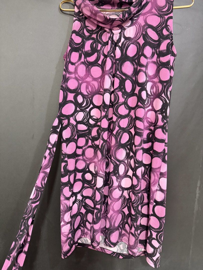 Pink and Black Abstract Circle Pattern Sleeveless Dress (Category: Dresses) located in Taguig. Submitted by patrisheaaa (Listing ID 1470858591, Image 3). Description: - Design: violet and black abstract circle pattern with a chic cowl neckline - Fit: Sleeveless with an adjustable matching fabric waist tie - Length: Knee-length, lightweight, and easy to wear - Occasion: Perfect for casual outings and daytime events - Condition: Excellent pre-loved