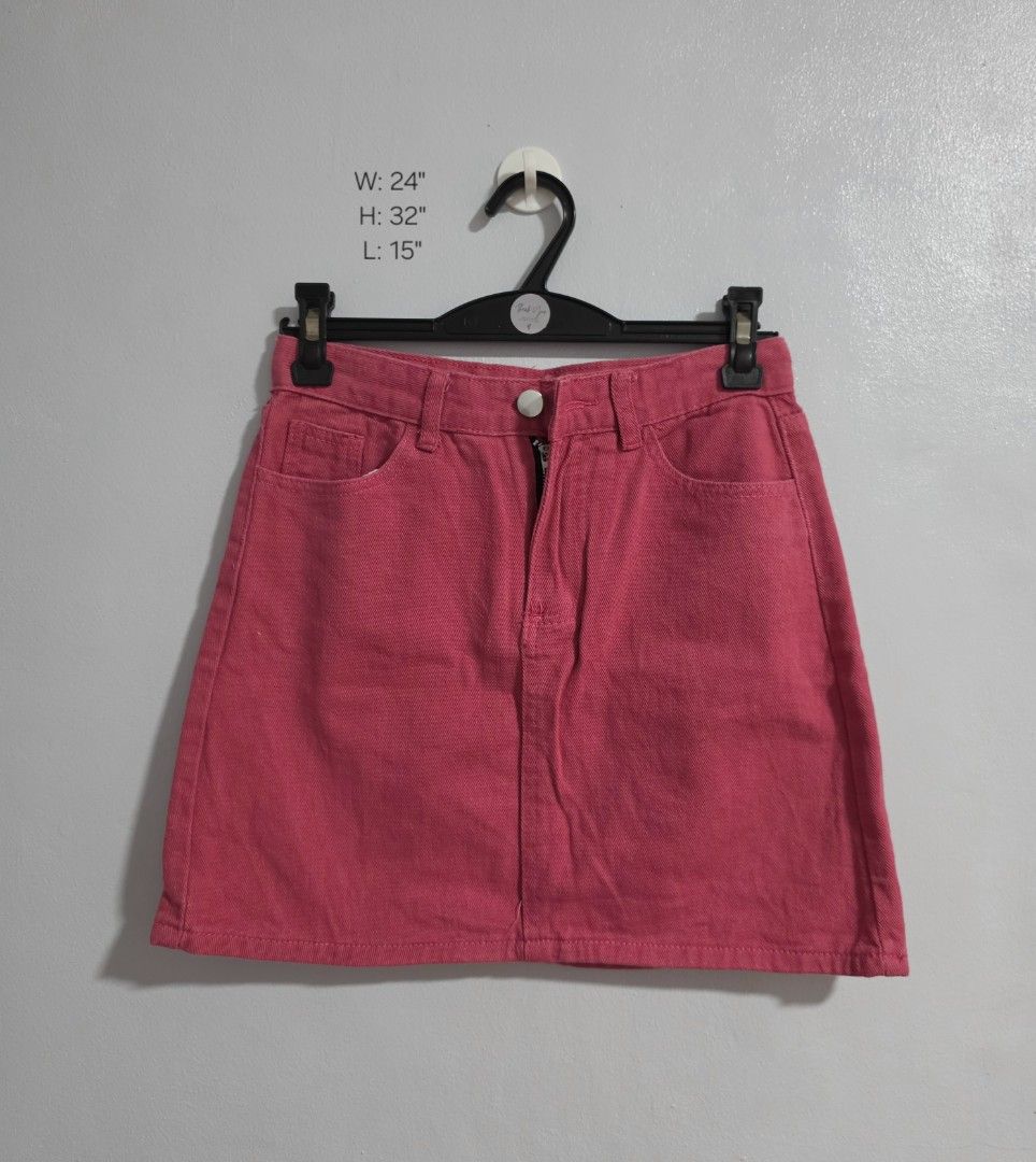 Pink Denim Skirt (Category: Skirts) located in Paranaque City. Submitted by franinnashop (Listing ID 1470796210, Image 1). Description: Declutter - Color: Bright pink - Closure: Front button and zipper - Pockets: Classic five-pocket design with back pockets - Features: Belt loops and straight hemline - Measurements: 24" waist, 32" hip, 15" length - Condition: Brand new / Excellent.