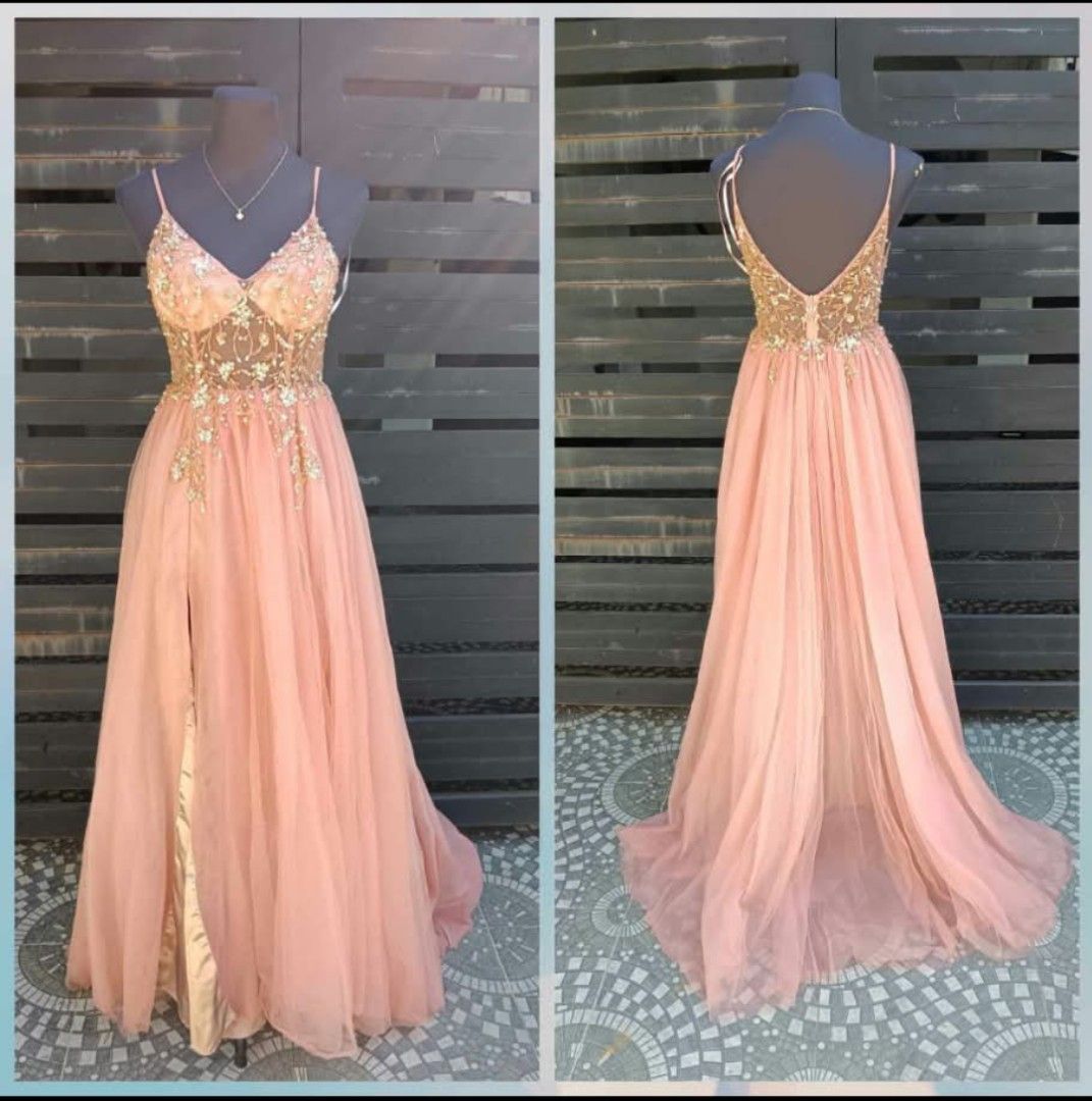Pink Spaghetti Strap Evening Gown with Slit (Category: Evening dresses & gowns) located in Valenzuela. Submitted by timoylazaro (Listing ID 1470906071, Image 1). Description: - Color: Pink with gold details - Length: Floor-length with a train - Design: Spaghetti straps, V-neckline, deep V-back - Details: Sheer bodice with gold floral embroidery and sequins - Feature: High side slit with gold lining underneath - Condition: Worn once, professionall