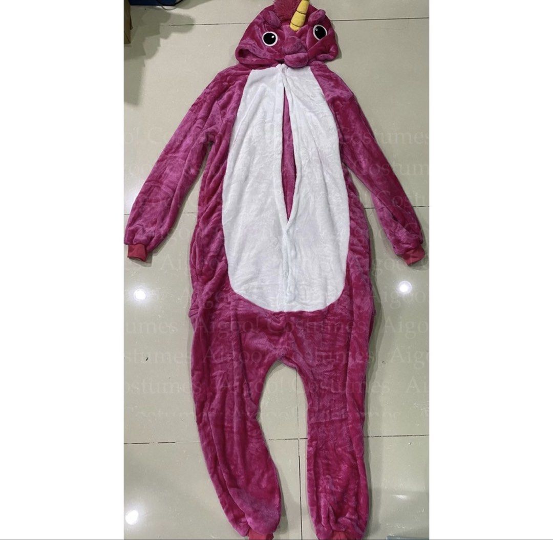 Pink Unicorn Onesie Pyjamas Costume (Category: Sleep and Loungewear) located in Manila. Submitted by aprilled (Listing ID 1470824995, Image 1). Description: - Style: Fuzzy pink unicorn onesie with attached hood, ears, and yellow horn - Material: Super soft plush all over - Features: Convenient front button-up closure - Condition: Worn just a couple of times, very clean with no stains or tears - Perfect for: Costume parties, cozy lounging at home,
