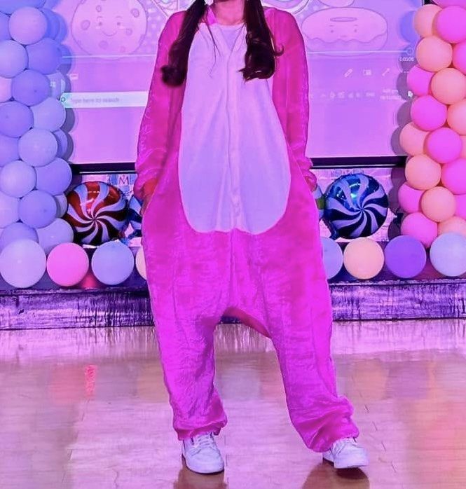 Pink Unicorn Onesie Pyjamas Costume (Category: Sleep and Loungewear) located in Manila. Submitted by aprilled (Listing ID 1470824995, Image 2). Description: - Style: Fuzzy pink unicorn onesie with attached hood, ears, and yellow horn - Material: Super soft plush all over - Features: Convenient front button-up closure - Condition: Worn just a couple of times, very clean with no stains or tears - Perfect for: Costume parties, cozy lounging at home,