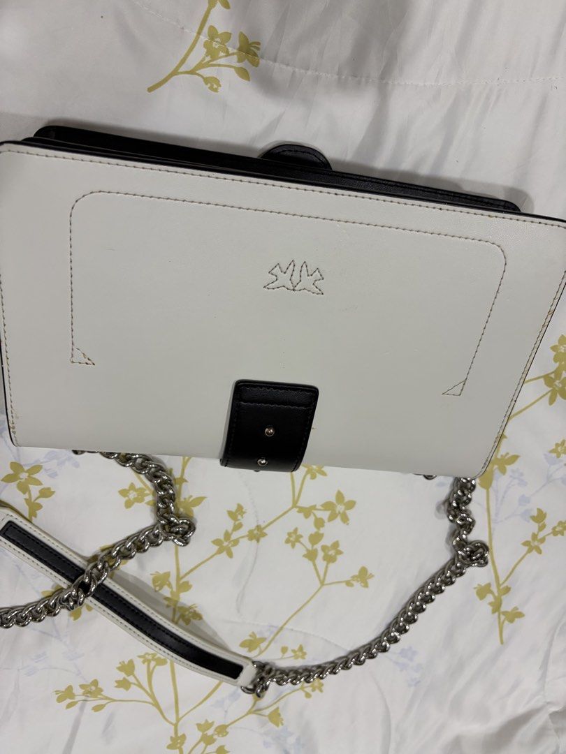 PINKO Love Evolution Shoulder Bag Limited edition (Category: Cross-body Bags) located in Santa Rosa. Submitted by moriza22 (Listing ID 1470894554, Image 3). Description: Material Natural leather Color white&black Brands Pinko Height: 16.5 cm Width: 7 cm Length: 27 cm.