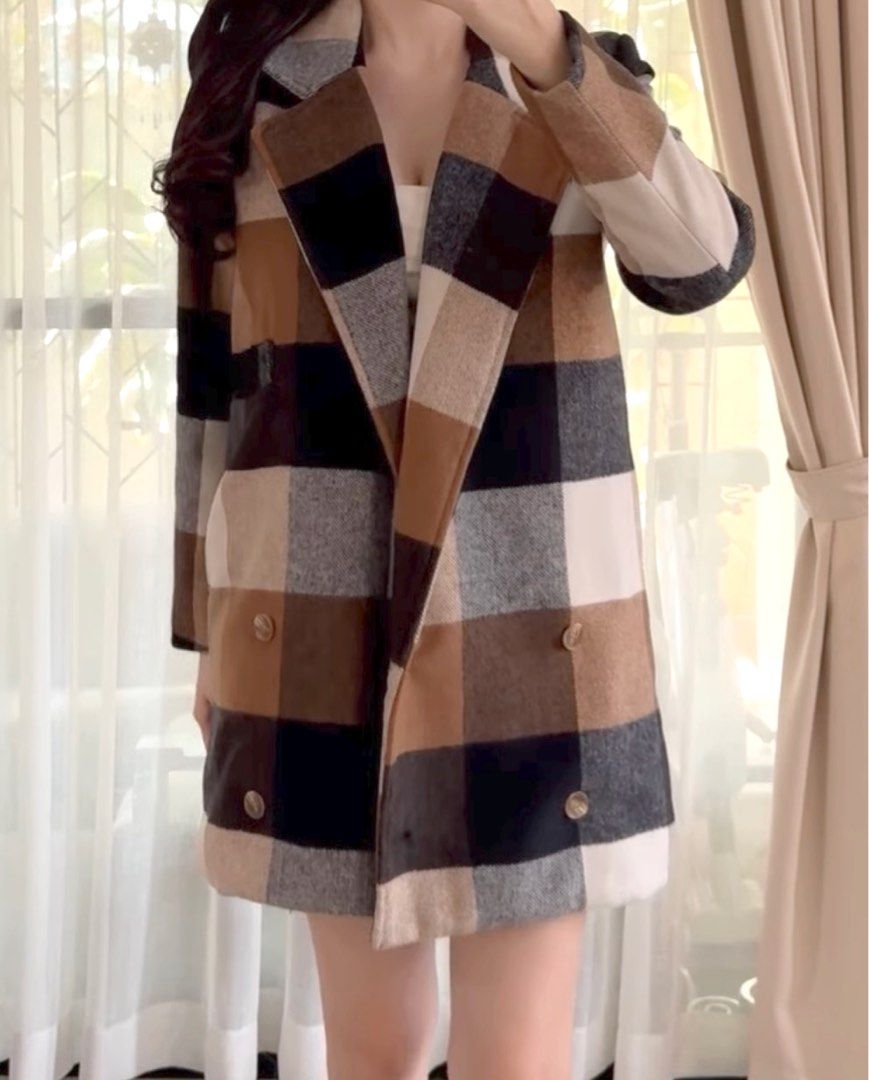 Plaid Checkered Wool Blend Long Coat (Category: Coats, Jackets and Outerwear) located in Antipolo. Submitted by tintintin_19 (Listing ID 1470915593, Image 1). Description: Winter & Autumn coat Size: fits small to medium Thick and high quality!! Style: brown double-breasted wool coat with side pockets; mid length perfect for autumn and post-winter season Condition: 9/10 used twice only for my winter trips :).