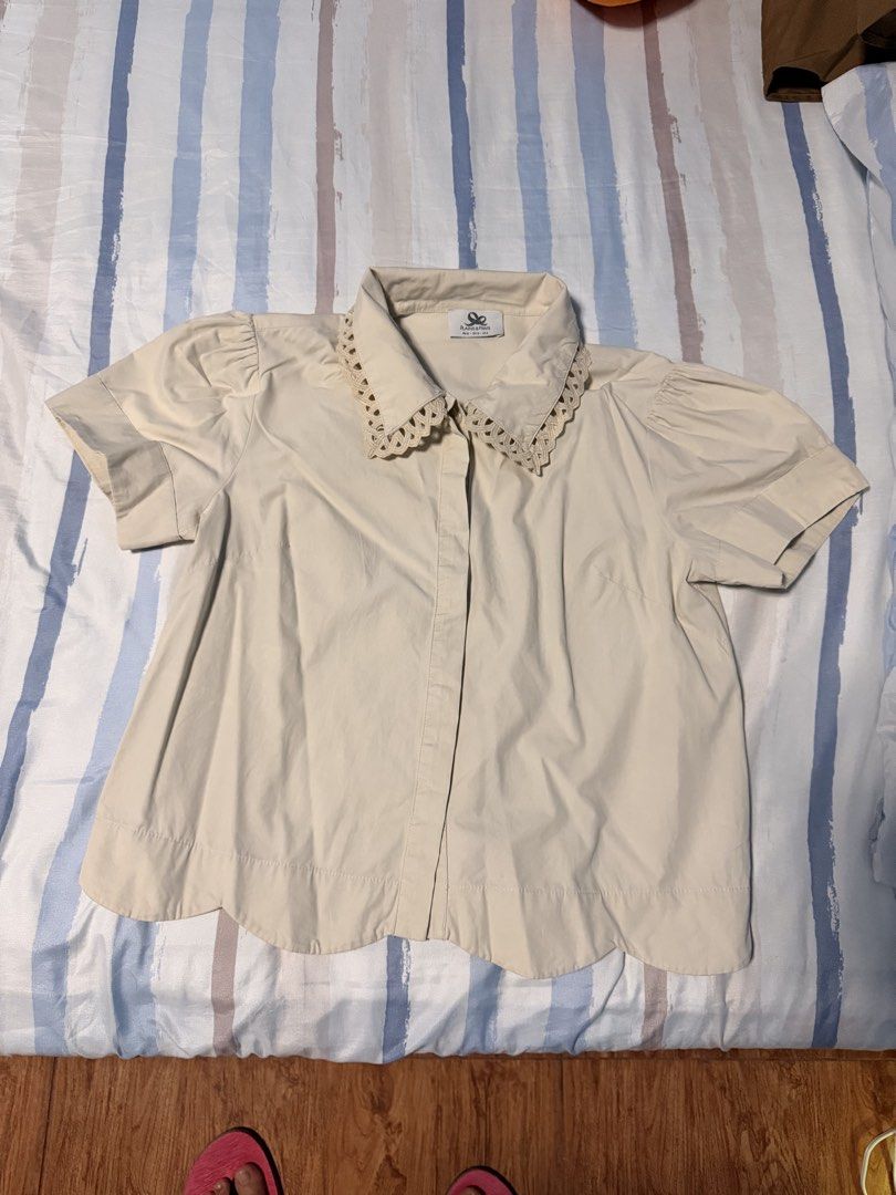Plains & Prints Cream Blouse with Scalloped Hem (Category: Blouses) located in Valenzuela. Submitted by criszaconcepcion (Listing ID 1470896111, Image 1). Description: - Brand: Plains & Prints - Color: Cream - Style: Short-sleeve blouse with gathered puff sleeves - Details: Intricate lace collar with cutout patterns, hidden button-down front, and a scalloped hem -bdo payment What you see is what you get No when worn.
