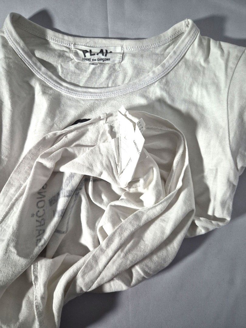 PLAY / COMME des GARÇONS (Category: Shirts) located in Antipolo. Submitted by saribymonica (Listing ID 1470871705, Image 3). Description: Size: Small • Stored in the cabinet, so the item may be wrinkled and may need ironing. • Colors may vary slightly due to lighting and screen settings. • Please check all photos carefully before purchasing. • Sold as is. No returns, refunds, or exchanges once sold. • Serious buyers only. Please respect each othe