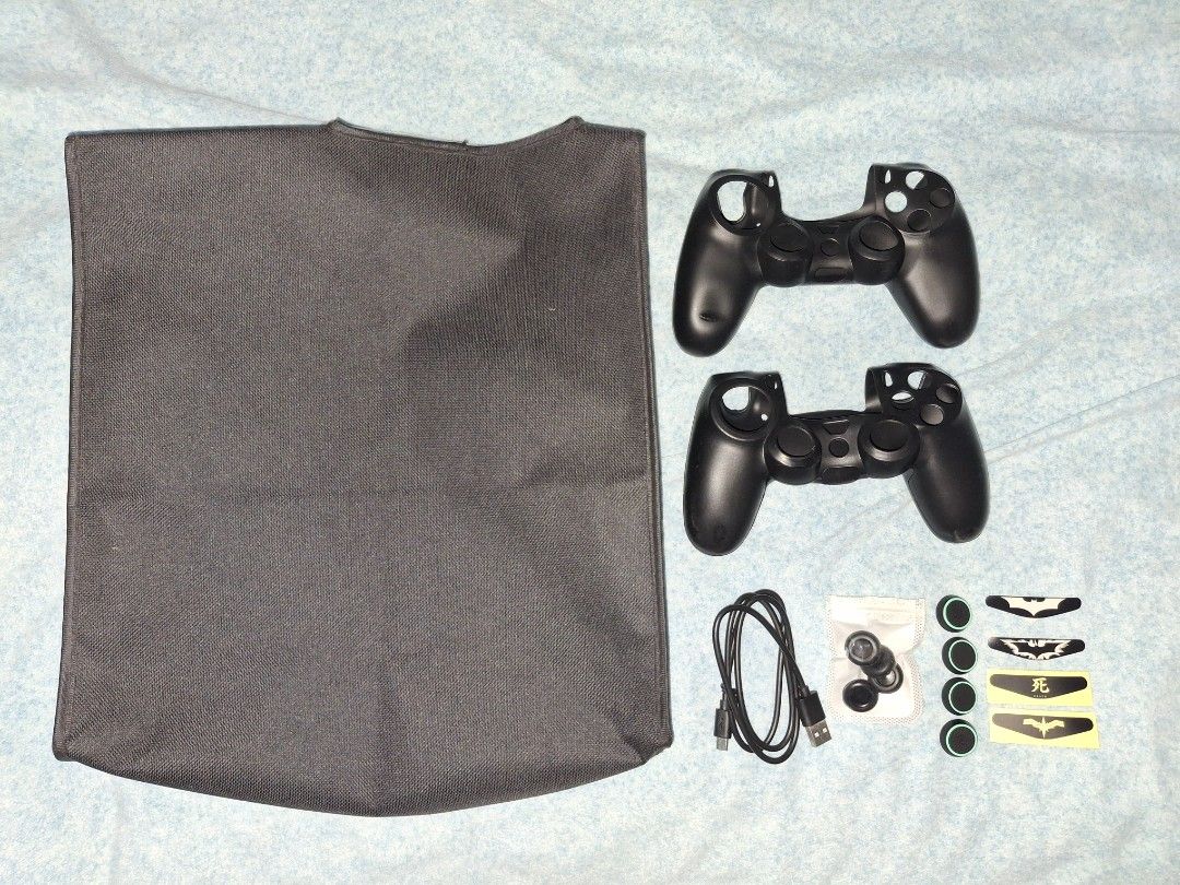 PlayStation 4 Slim 1TB Console with Two Controllers and Games (Category: PlayStation) located in General Trias. Submitted by maxinne_gb (Listing ID 1470776712, Image 3). Description: - Console: PlayStation 4 Slim 1TB (Fully tested and 100% working) - Controllers: 2 units included (1 Original DualShock 4 + 1 OEM controller) - Games: Far Cry 5 and Tiny Tina's Wonderlands - Accessories included: Charging cable, extra thumb grips, decorative stickers