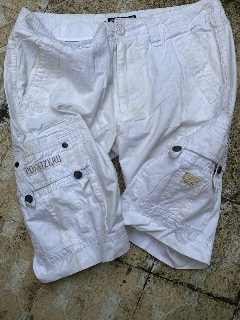 Point Zero White Cargo Shorts with Multi Pockets (Category: Shorts) located in Imus. Submitted by frootiloots4103 (Listing ID 1470767755, Image 2). Description: - Brand: Point Zero - Color: White - Style: Casual summer cargo shorts - Pockets: Multiple utility pockets on the sides for extra storage - Details: Branded buttons, contrast stitching, and embroidered brand lettering on the side pocket - Closure: Button fly closure with belt loops OPEN F