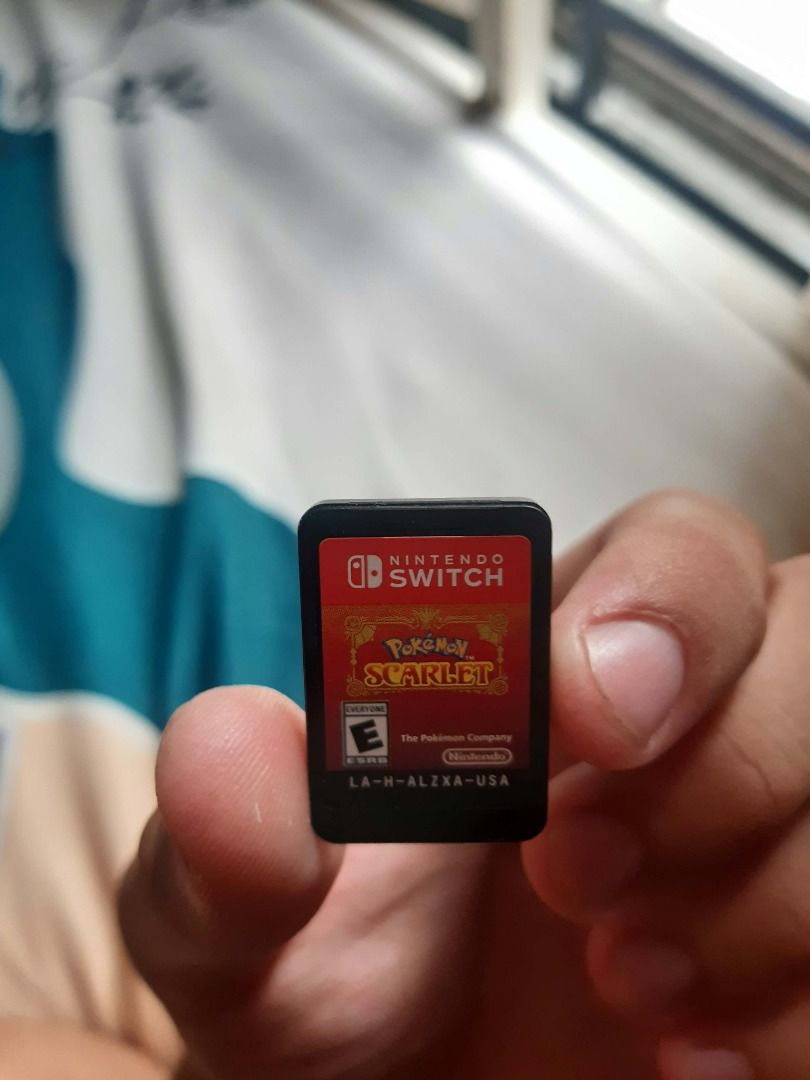Pokémon Scarlet Nintendo Switch Game (Category: Nintendo) located in Caloocan City. Submitted by mr_lafario (Listing ID 1470815766, Image 2). Description: - Platform: Nintendo Switch (Physical Cartridge) - Title: Pokémon Scarlet - Region: USA - Condition: Tested and 100% working - Inclusion: Original game case with cover art - Genre: RPG Adventure.