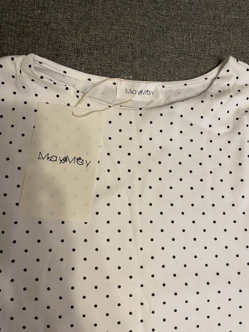 Polka Dots Long Sleeves Top (Category: Blouses) located in Quezon City. Submitted by mfordma (Listing ID 1470874058, Image 2). Description: BRAND NEW Originally bought for 399.00 Doing a little closet decluttering! ✨ Letting go of some pieces that are still in great condition and looking for a new home. 🤍 Brand: MayMay Size: Free size Color: White and Black Description: - Very stretchable soft long sleeve top with black polka dots - Fitted cut w