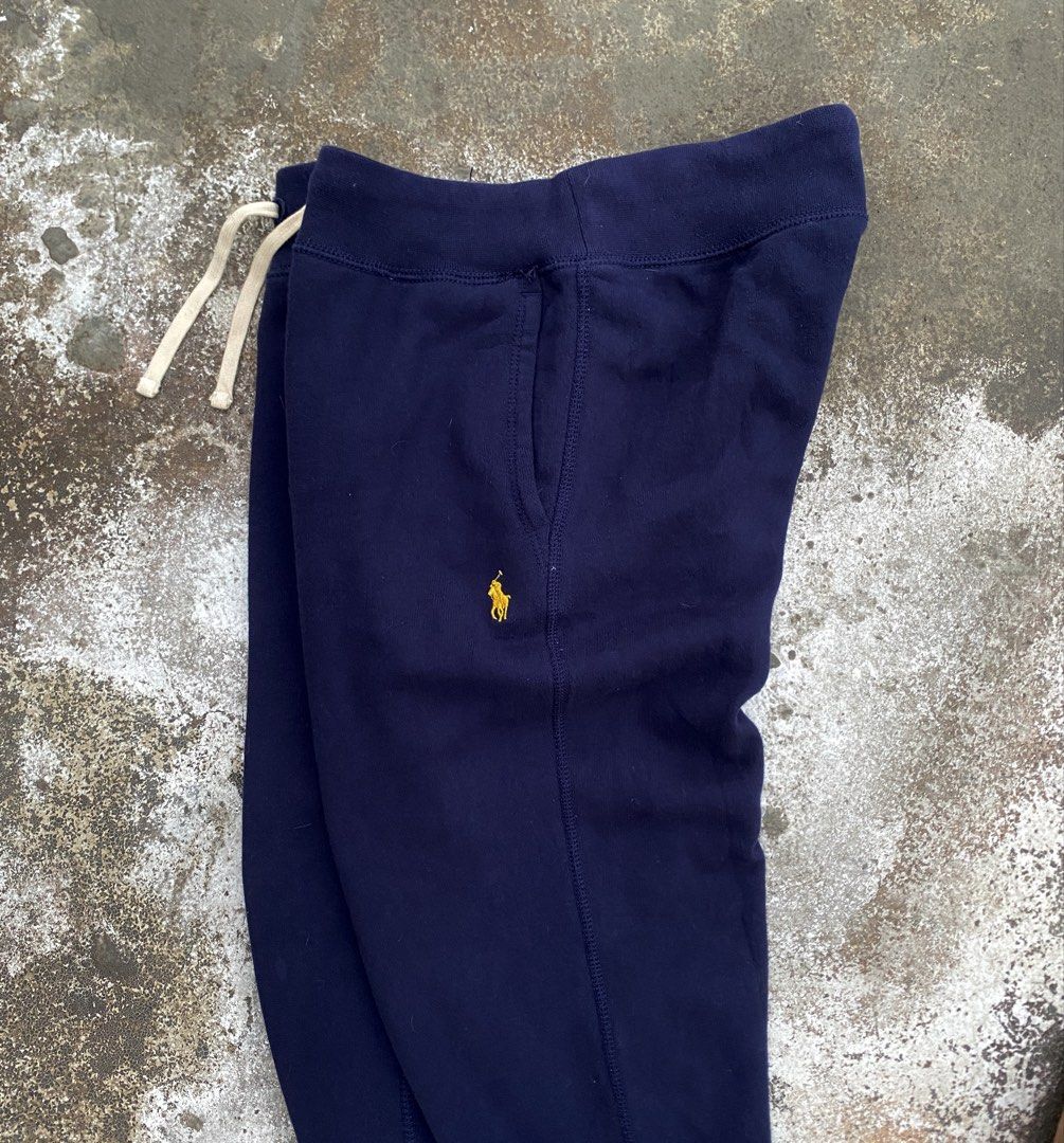 Polo by Ralph Lauren Jog sweatpants (Category: Joggers) located in Antipolo. Submitted by treasurethings02 (Listing ID 1470919600, Image 2). Description: Excellent to Asnew Condition 9.5/10 CR Dimensions W30 L36 Small on tag Navy blue Color yellow pony Authentic ✅✅✅ Photo Detail.