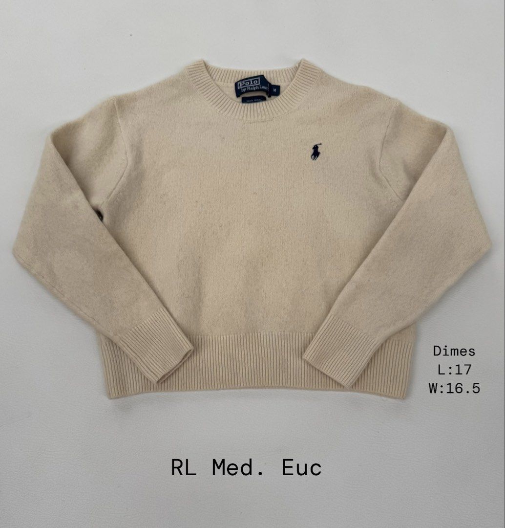 Polo Ralph Lauren Cream Wool Crewneck Sweater Medium (Category: Coats, Jackets and Outerwear) located in Pozorrubio. Submitted by izaykite2g (Listing ID 1470760021, Image 1). Description: - Brand: Polo Ralph Lauren - Style: Crewneck sweater - Color: Cream with dark navy blue embroidered pony logo - Size: Medium - Measurements: Length 17", Width 16.5" - Details: Ribbed collar, cuffs, and hem.