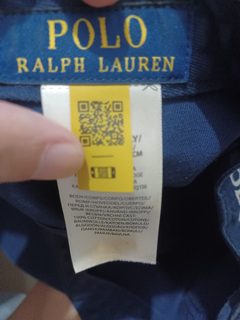 Polo Ralph Lauren Navy Baseball Cap (Category: Caps & Hats) located in Mandaluyong City. Submitted by usamenfashionhaul (Listing ID 1470912608, Image 3). Description: - Brand: Polo Ralph Lauren - Color: Dark blue - Material: 100% Cotton (verified by interior tags) - Design: Embroidered player logo on the front - Back Detail: 'POLO' embroidered text with adjustable metal buckle strap - Condition: Excellent, ready to wear - Perfect for casual every