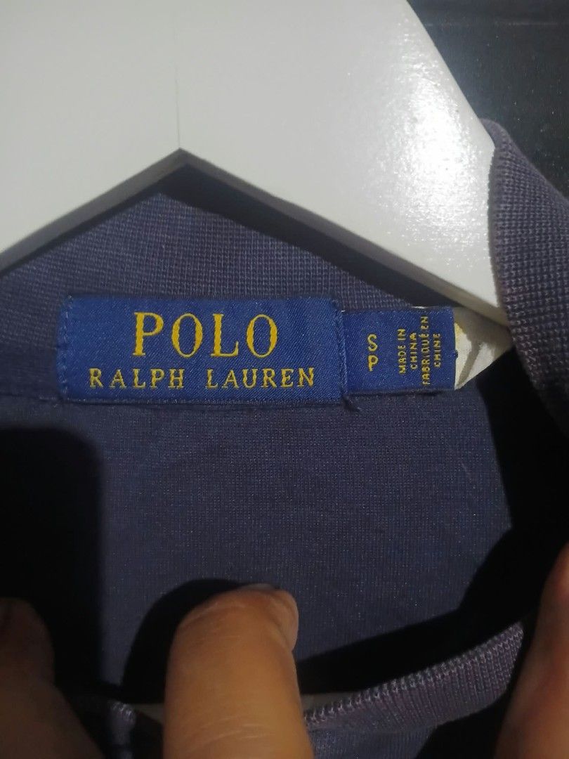 Polo Ralph Lauren Navy Zip Jacket Size S (Category: Coats, Jackets and Outerwear) located in Angeles City. Submitted by ukaythrift2.0 (Listing ID 1470877382, Image 2). Description: - Brand: Polo Ralph Lauren - Color: Navy Blue - Size: Small (S) - Material: Cotton & polyester blend - Design: Full zip closure with metal pull, white embroidered pony logo on chest - Details: Ribbed collar and cuffs - Origin: Made in China.
