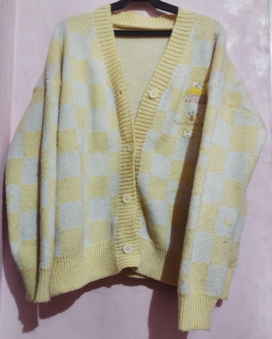 Pompompurin Yellow Checkered Cardigan (Category: Coats, Jackets and Outerwear) located in Manila. Submitted by will_willow29957 (Listing ID 1470756232, Image 1). Description: 🍮 Pompompurin Yellow and White Checkered Cardigan 💰 Price: ₱200 ✨ Pre-Loved 💕 Details • Unofficial/From TikTok Shop • Listed Originally As "Free Size" But Is Around a Medium-Large • Color: Yellow and White • Condition: Used 📌 Please Note 💕 The fabric of the sweater has 