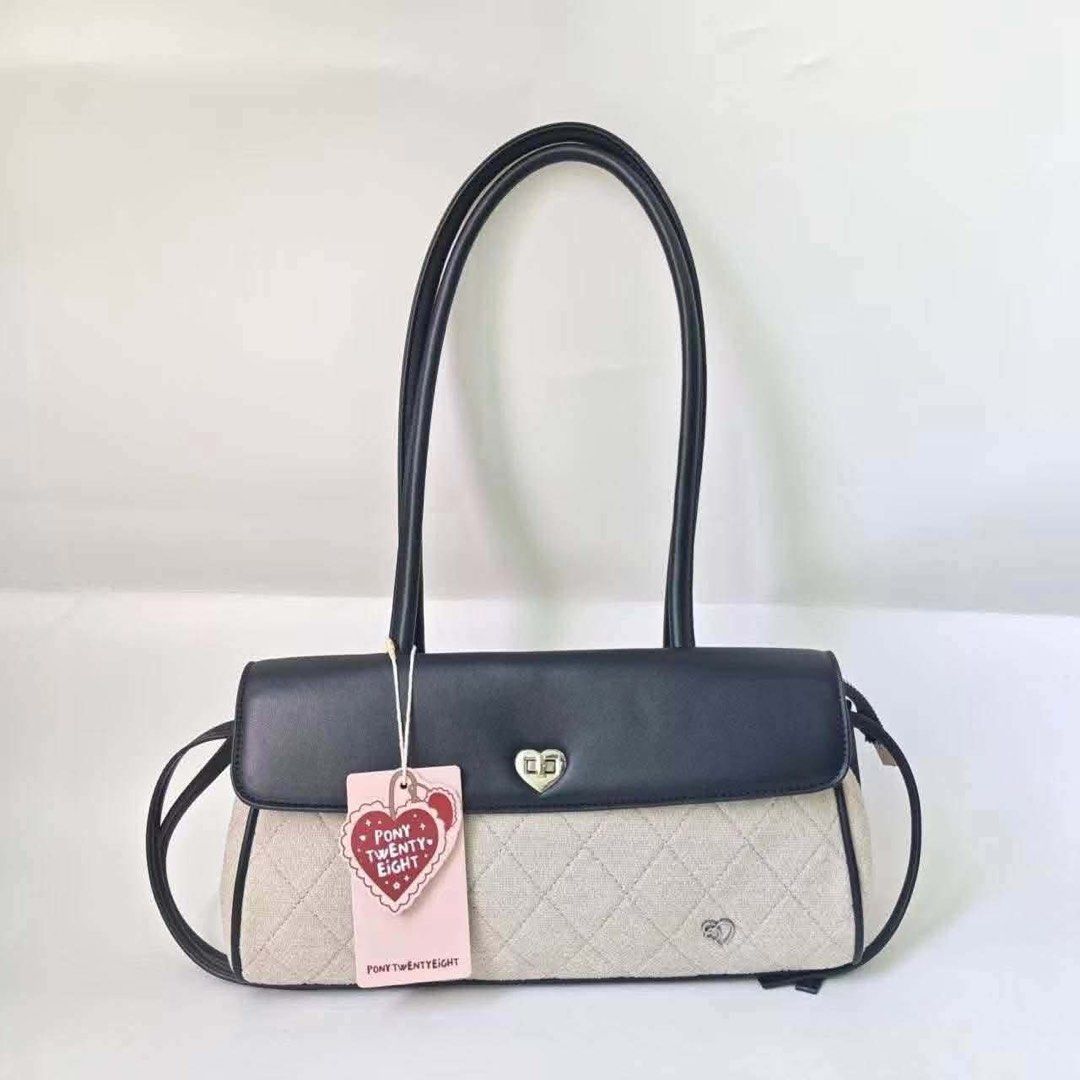 Pony Twenty Eight Quilted Shoulder Bag Tote (Category: Shoulder Bags) located in Batangas. Submitted by shairapretty (Listing ID 1470885995, Image 2). Description: -PRE-ORDER P0NY •w dustbag and tag - Style: Shoulder bag with quilted texture and smooth contrast flap - Closure: Cute heart-shaped front turn-lock - Details: Small embroidered heart emblem, side handle accents, and pink brand tag - Straps: Double shoulder straps for easy carrying - Mo
