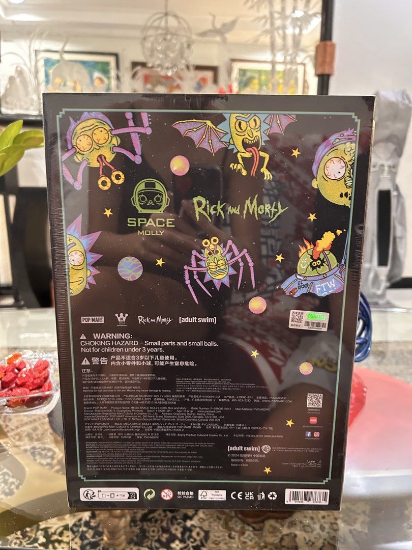 Pop Mart Mega Space Molly 400% Rick and Morty (Category: Designer & Blind Box Toys) located in Manila. Submitted by tprdo09 (Listing ID 1470825745, Image 2). Description: Pop Mart Mega Space Molly 400% Rick and Morty collectible figure. Sealed box in original packaging. Stands 11.61 inches tall. Detailed artwork from the animated series across the suit and helmet. Official Pop Mart collaboration piece with authentication sticker intact on the bac