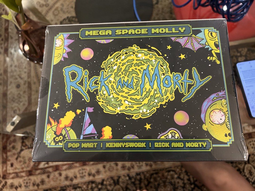 Pop Mart Mega Space Molly 400% Rick and Morty (Category: Designer & Blind Box Toys) located in Manila. Submitted by tprdo09 (Listing ID 1470825745, Image 3). Description: Pop Mart Mega Space Molly 400% Rick and Morty collectible figure. Sealed box in original packaging. Stands 11.61 inches tall. Detailed artwork from the animated series across the suit and helmet. Official Pop Mart collaboration piece with authentication sticker intact on the bac