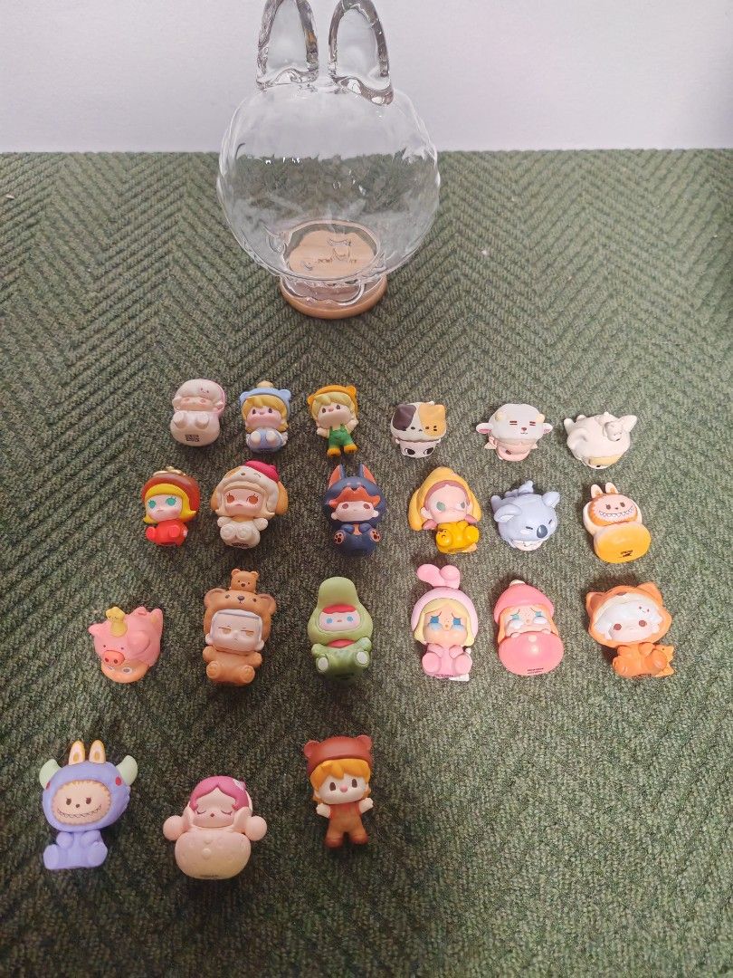 Pop Mart PopBeans (Category: Designer & Blind Box Toys) located in Quezon City. Submitted by sashasarisarishoppe (Listing ID 1470759077, Image 2). Description: - Pop Mart The Monsters Lying Baby mini figures by Pop Bean - Includes 1 unopened 6-piece carded set - Comes with a large stash of loose figures st - Features various cute animal and character outfits - Ideal haul for Labubu and designer toy collectors looking for sets or doubles .