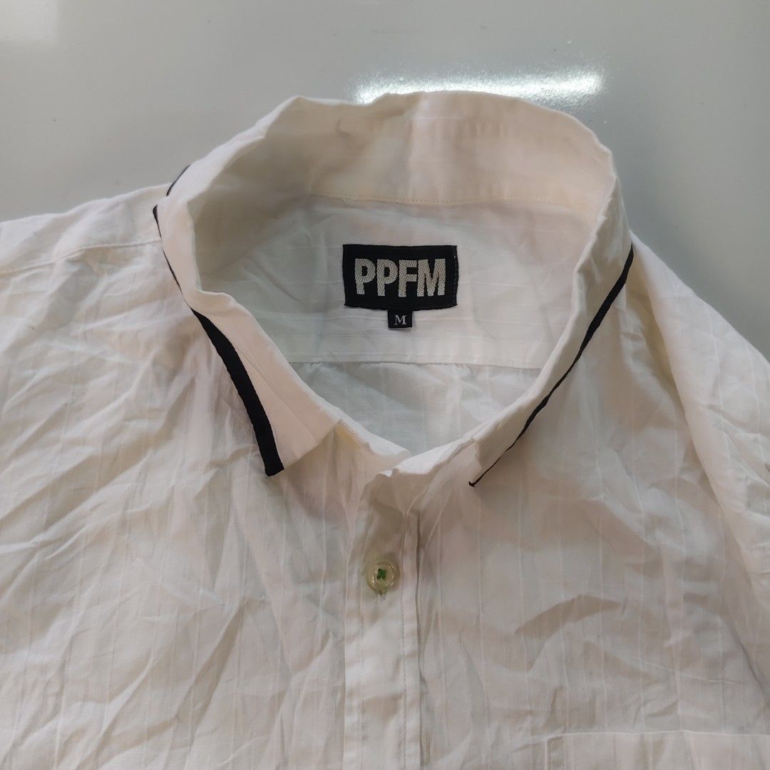 ppfm polo (Category: Activewear) located in Amadeo. Submitted by josephotep (Listing ID 1470838114, Image 2). Description: ppfm polo m on tag 19x25 minimal sige on usage.