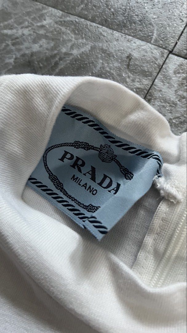 Prada Dress Ribbon (Category: Dresses) located in Manila. Submitted by reclaim.13 (Listing ID 1470826115, Image 3). Description: Prada Dress Ribbon - Excellent Condition - 18 width , 33 length - 9.8/10 - no issue.