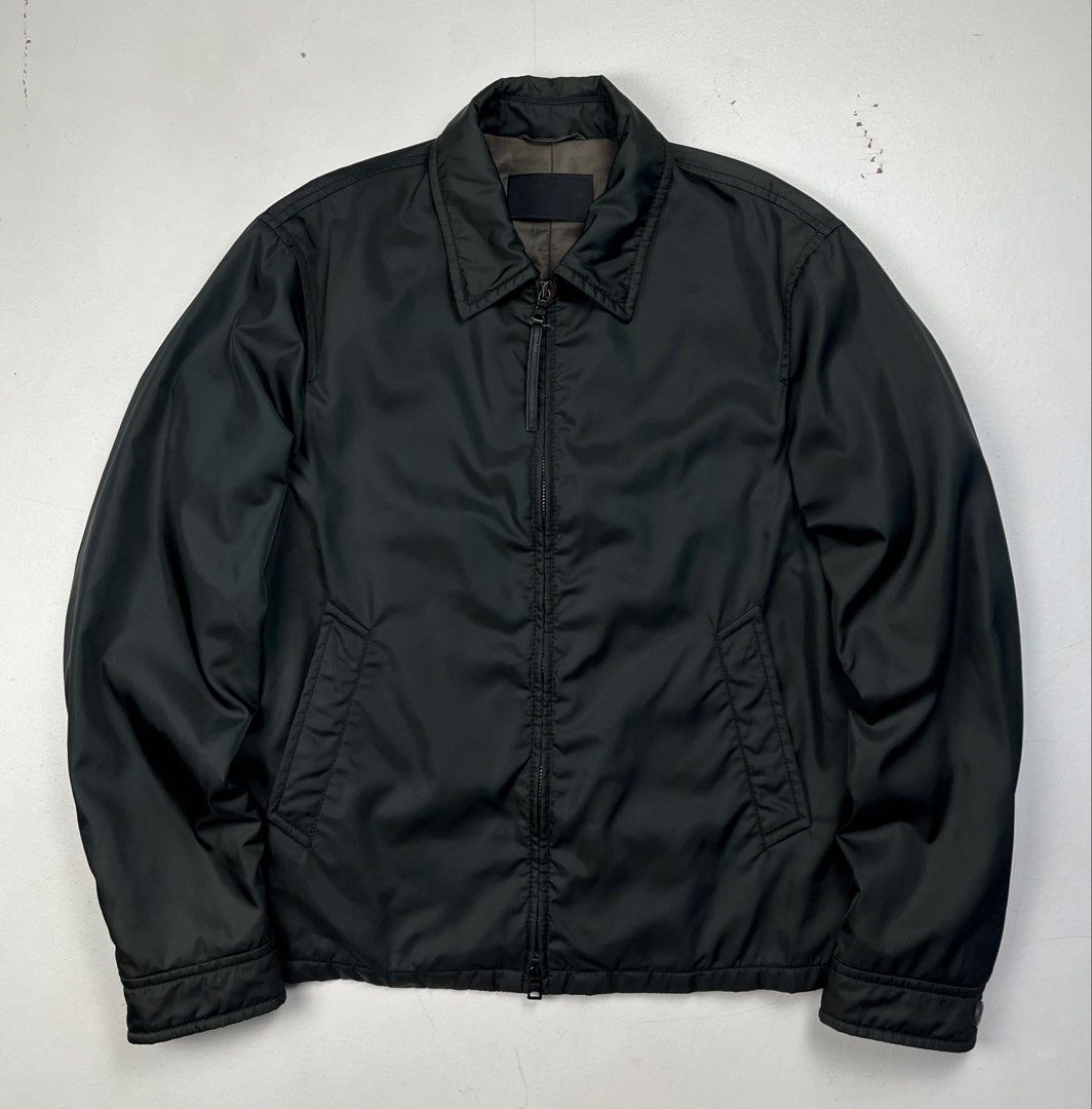 Prada Early 2000s Nylon Insulated Harrington Jacket (Category: Luxury Apparel) located in Quezon City. Submitted by forgarments (Listing ID 1470849988, Image 1). Description: Prada Early 2000s Nylon Insulated Harrington Jacket Excellent Condition Size: Medium Shoulder: 19 Inches Chest width: 23 Inches Sleeve: 27 Inches Length: 27 Inches Hem: 21 Inches - 100% Nylon shell that like has a iridescent effect | 100% Polyester padding - Made in Italy.