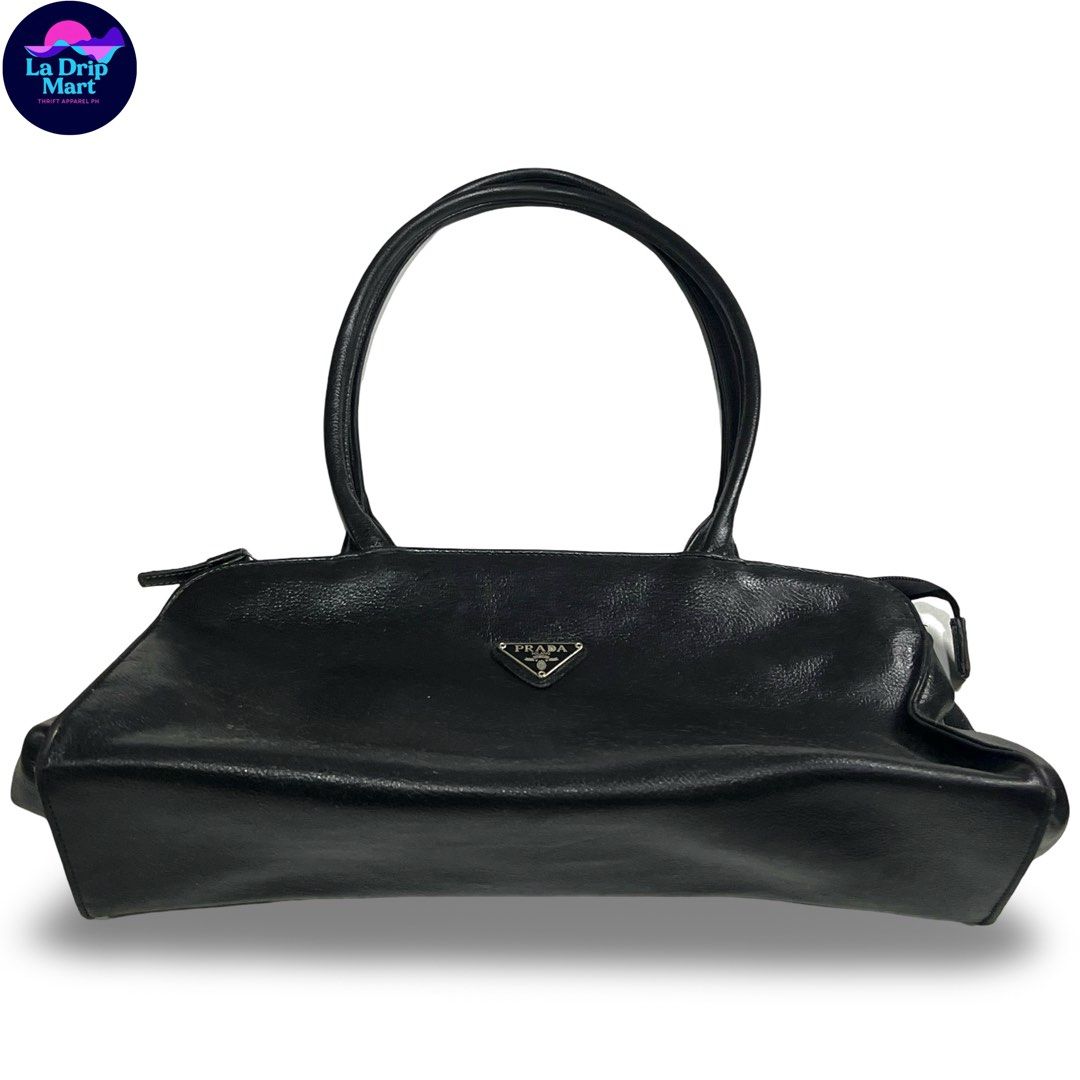 ‎“PRADA MILANO BONNIE MEDIUM HANDBAG (Category: Shoulder Bags) located in Taguig. Submitted by ldm.ph (Listing ID 1470914824, Image 1). Description: ‎(LDM-A-0049) ‎Dimensions Inches width:15 ‎Inches length:8 ‎Condition: EXCELLENT ‎Color rate:9.5 ‎Flaws:❌ ‎(READY TO WEAR).