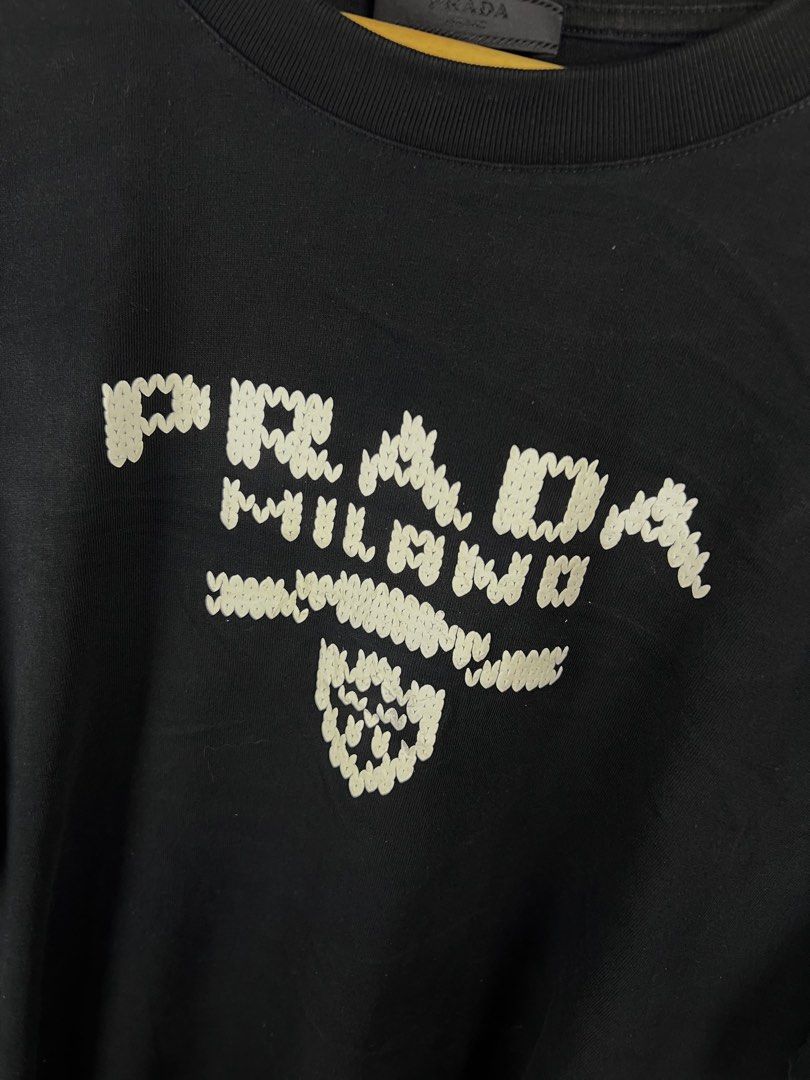‎“PRADA MILANO” PUFFER SCRPT TEE (Category: Tshirts & Polo Shirts ) located in Taguig. Submitted by ldm.ph (Listing ID 1470744058, Image 3). Description: ‎(LDM-C-0295) ‎Size:ACTUAL FIT:L-XL ‎Dimensions ‎Inches width:23 ‎Inches length:30 ‎Condition: EXCELLENT ‎Color rate:9.5 ‎Flaws:❌ ‎(READY TO WEAR).